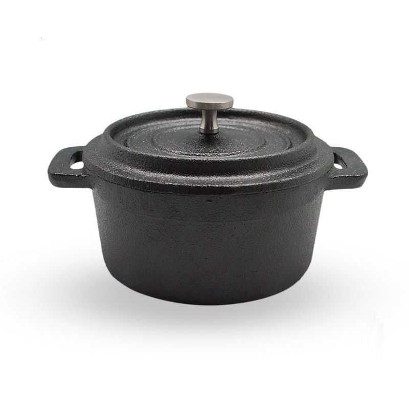 Small cast iron cooking pot with lid